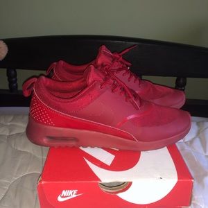 Women’s red Nike’s